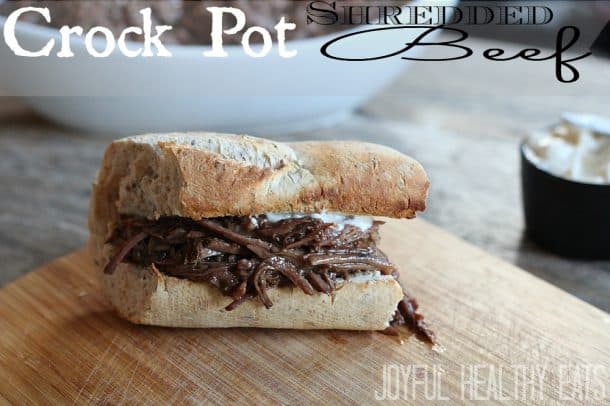 Crock Pot Shredded Beef Sandwich on a toasted bun with horseradish aioli