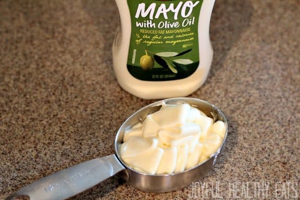 A measuring cup of mayonnaise