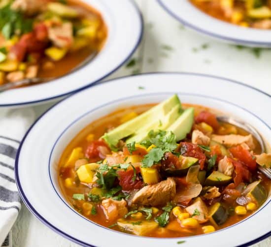 side photo of hearty chicken tortilla soup in a bowl