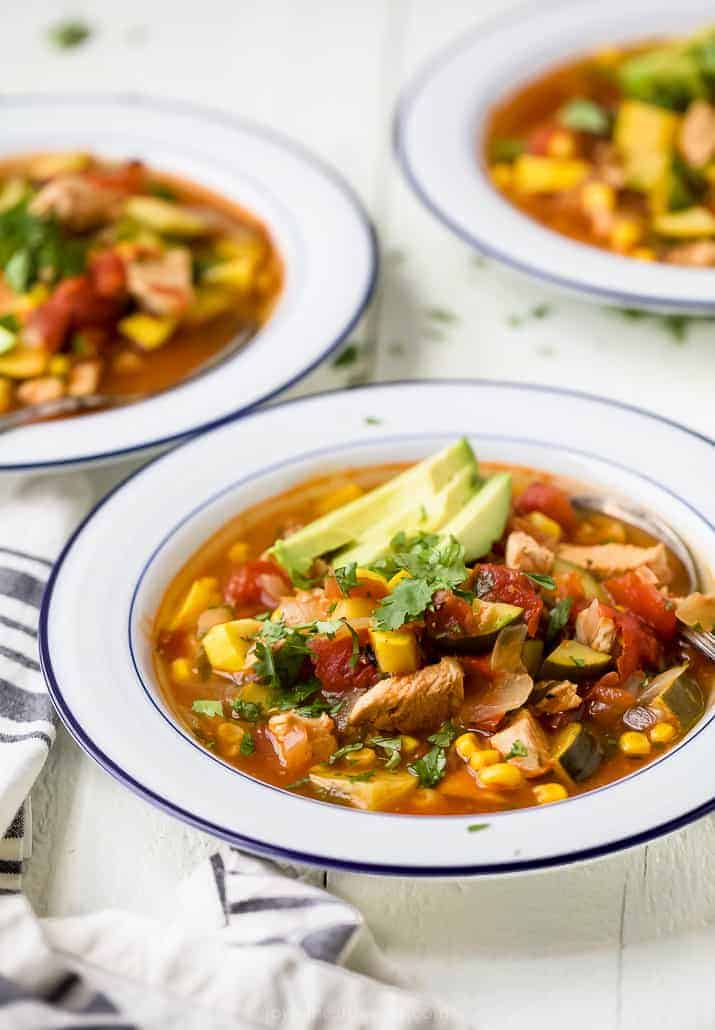 side photo of hearty chicken tortilla soup in a bowl