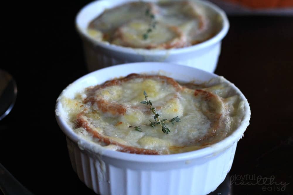 Two ramekins of French Onion Soup
