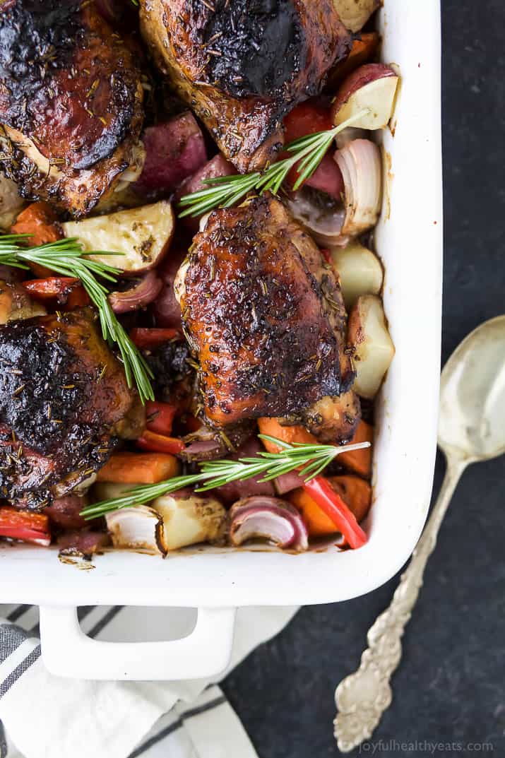 Easy One Pan Balsamic Chicken with Roasted Vegetables - a healthy paleo & gluten free recipe your family will devour! Tender juicy chicken covered in a sweet balsamic glaze has this one pan chicken bursting with flavor!