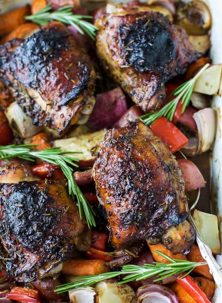 Easy One Pan Balsamic Chicken with Roasted Vegetables - a healthy paleo & gluten free recipe your family will devour! Tender juicy chicken covered in a sweet balsamic glaze has this one pan chicken bursting with flavor!