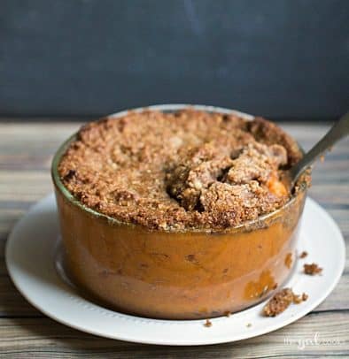 A baking dish of sweet potato casserole with crumb topping