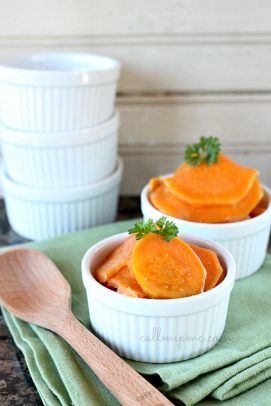 Two ramekins of sliced candied sweet potatoes