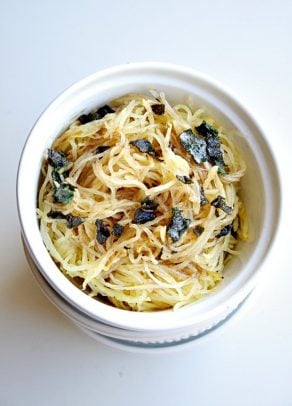 A bowl of brown butter spaghetti squash with crispy sage