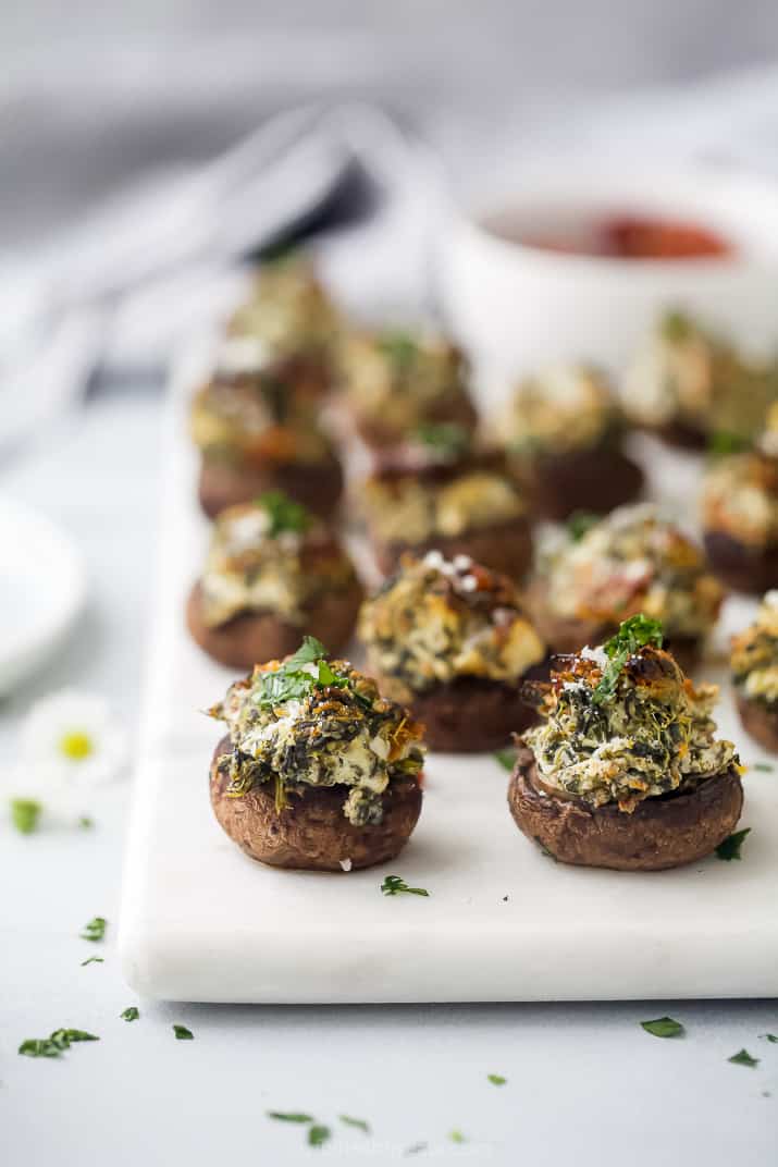 spinach stuffed mushrooms on a platter