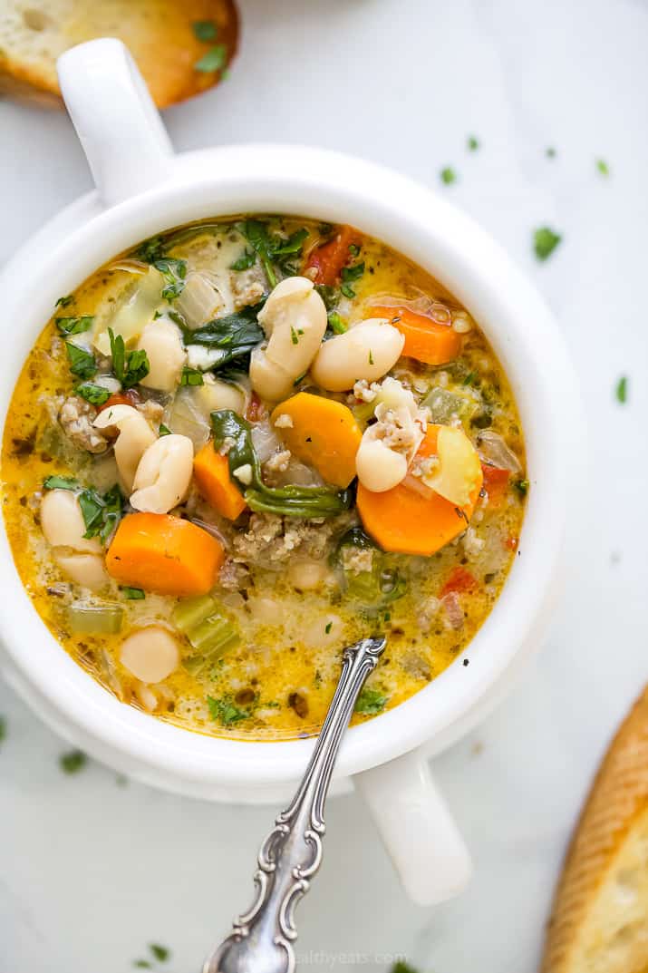 close up of a bowl filled with creamy tuscan white bean soup