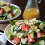 Image of a Avocado Strawberry Spinach Salad with Honey Mustard Vinaigrette