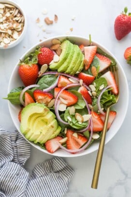 Bowl of strawberry spinach salad.