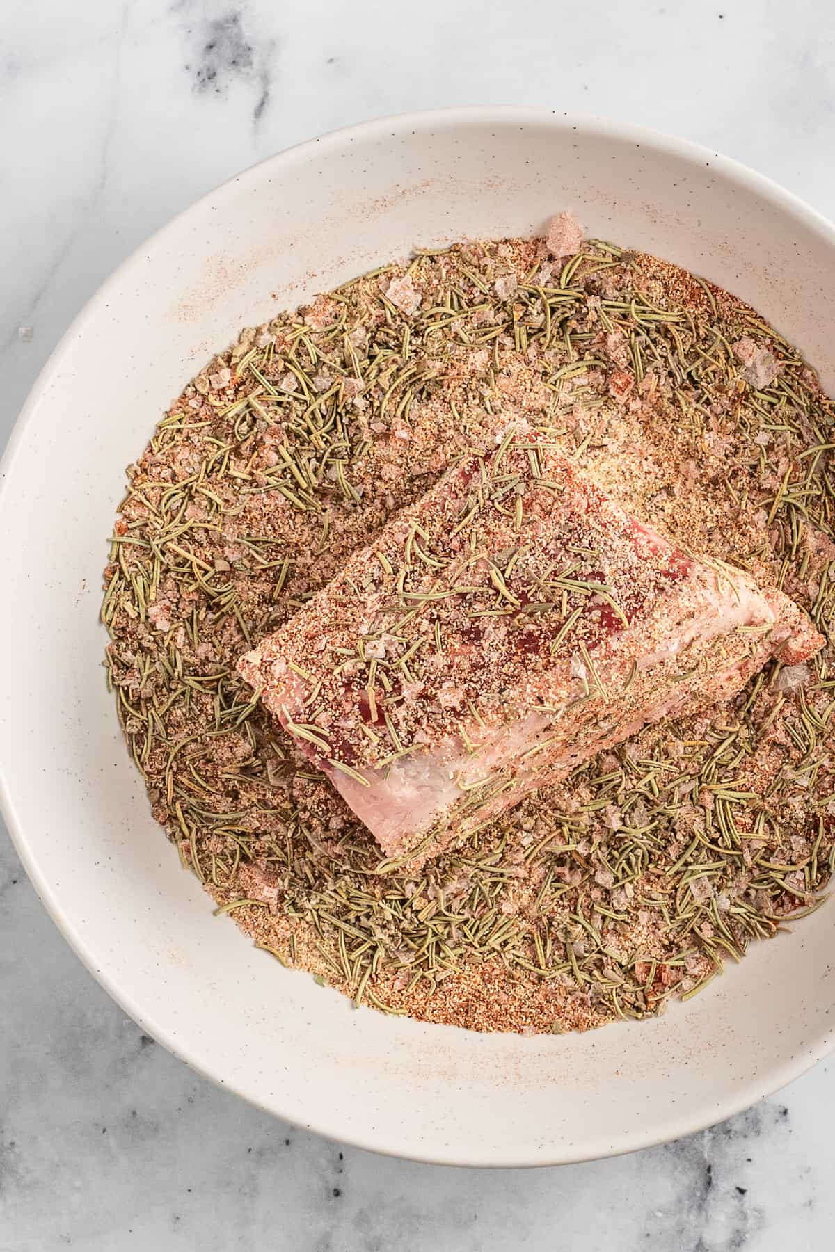 coating short rib pieces with dry spice mixture