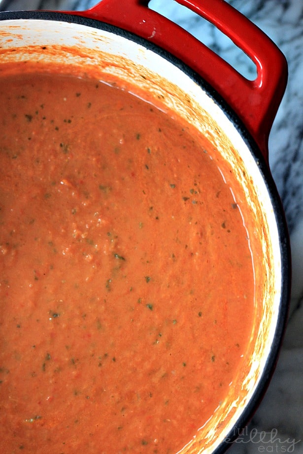 Top view of a pot of Creamy Tomato Basil Soup