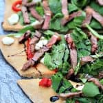 Four Slices of Homemade Pizza with Steak and Balsamic Reduction