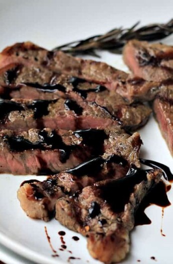 Image of New York Strip Steak with Balsamic Reduction on a Plate