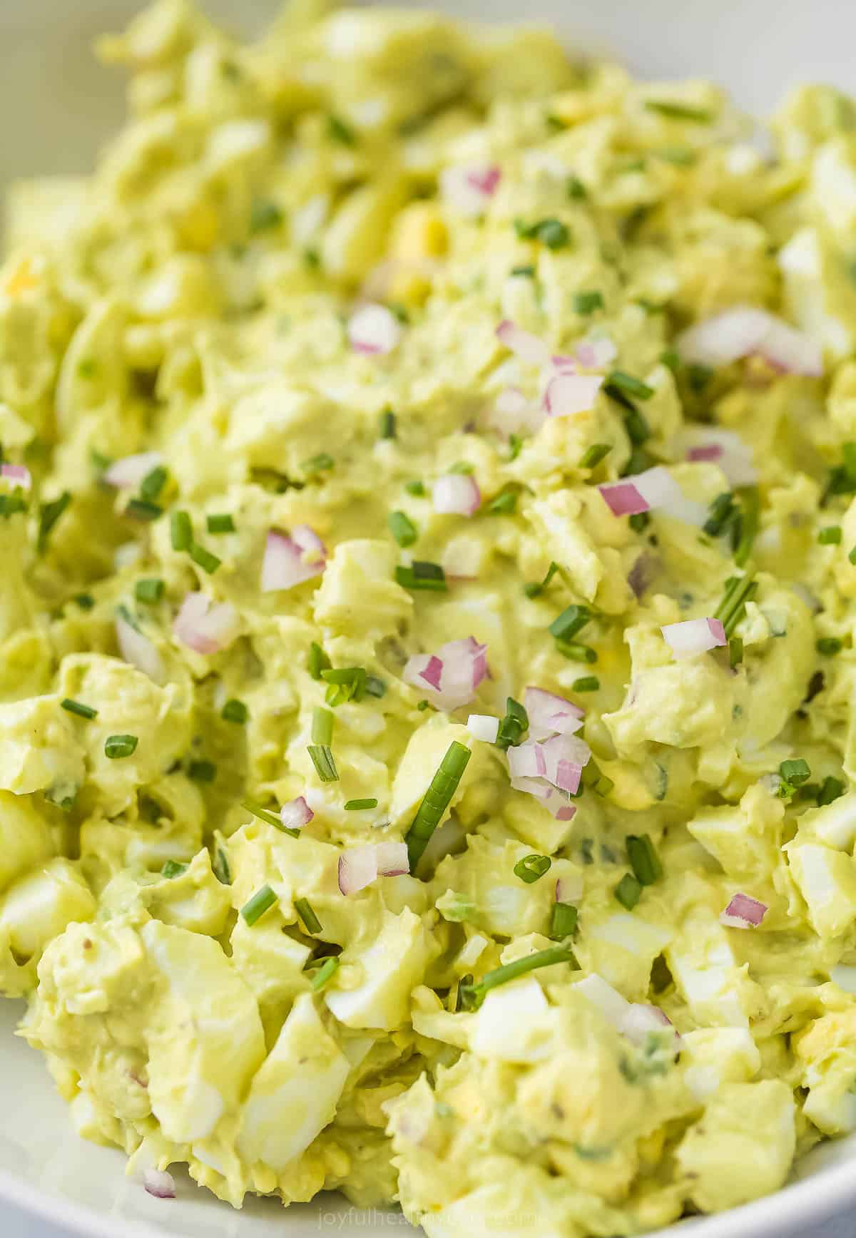 This Avocado Egg Salad is a healthy & satisfying salad made with less mayo! It's perfect for breakfast or lunch. egg salad made with mashed avocados
