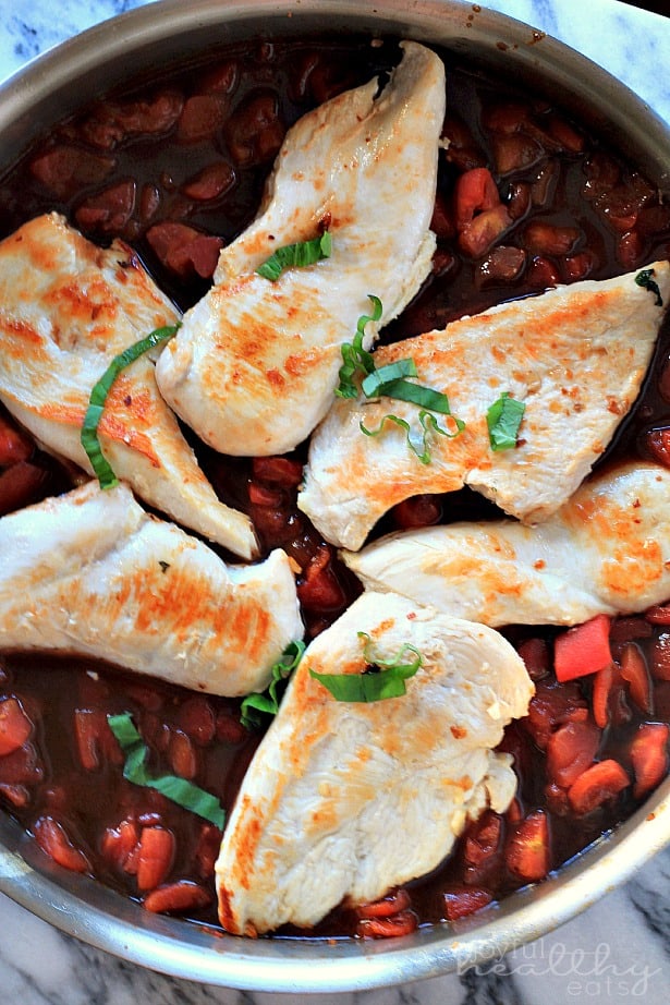 Balsamic Chicken browning in a skillet