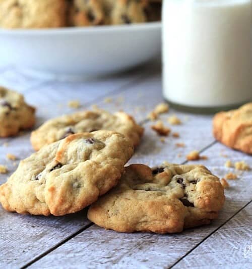 The Best Soft Chocolate Chip Cookies will you ever have! Half the butter and sugar, but same same great cookie taste! These are to die for! | joyfulhealthyeats.com