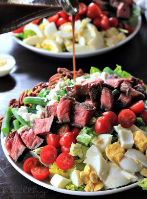 Ribeye Steak Salad with Balsamic Vinaigrette on a white plate