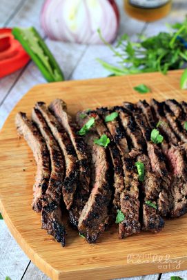 Grilled sliced skirt steak on a cutting board