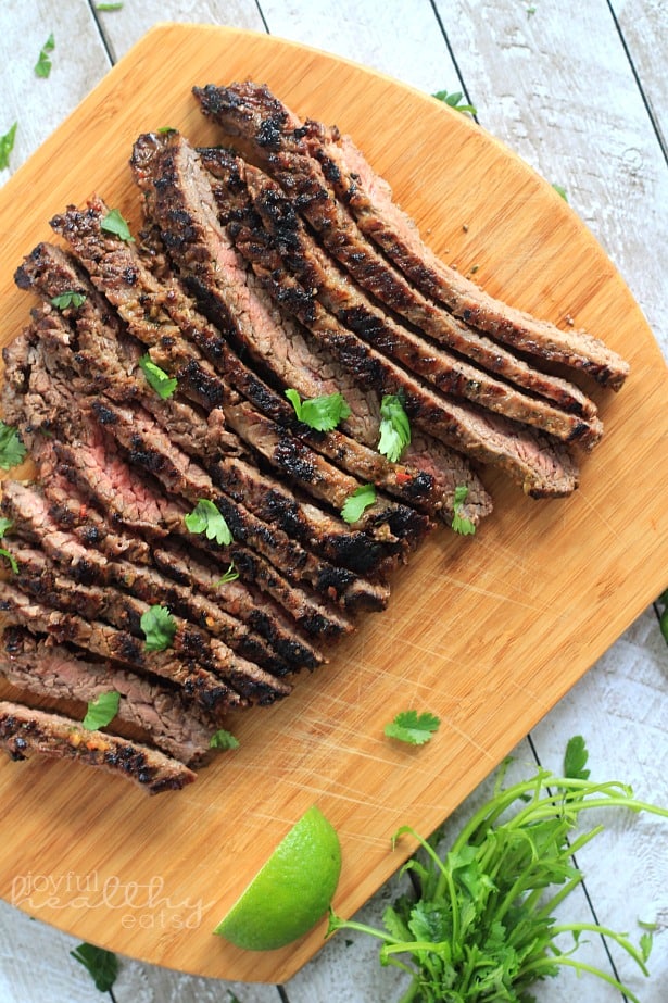 Top view of sliced Grilled Fajita Skirt Steak on a cutting board