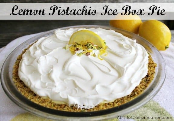 Title Image for Lemon Pistachio Ice Box Pie and a pie with a crumb crust, whipped cream topping and a lemon wedge and pistachios on top