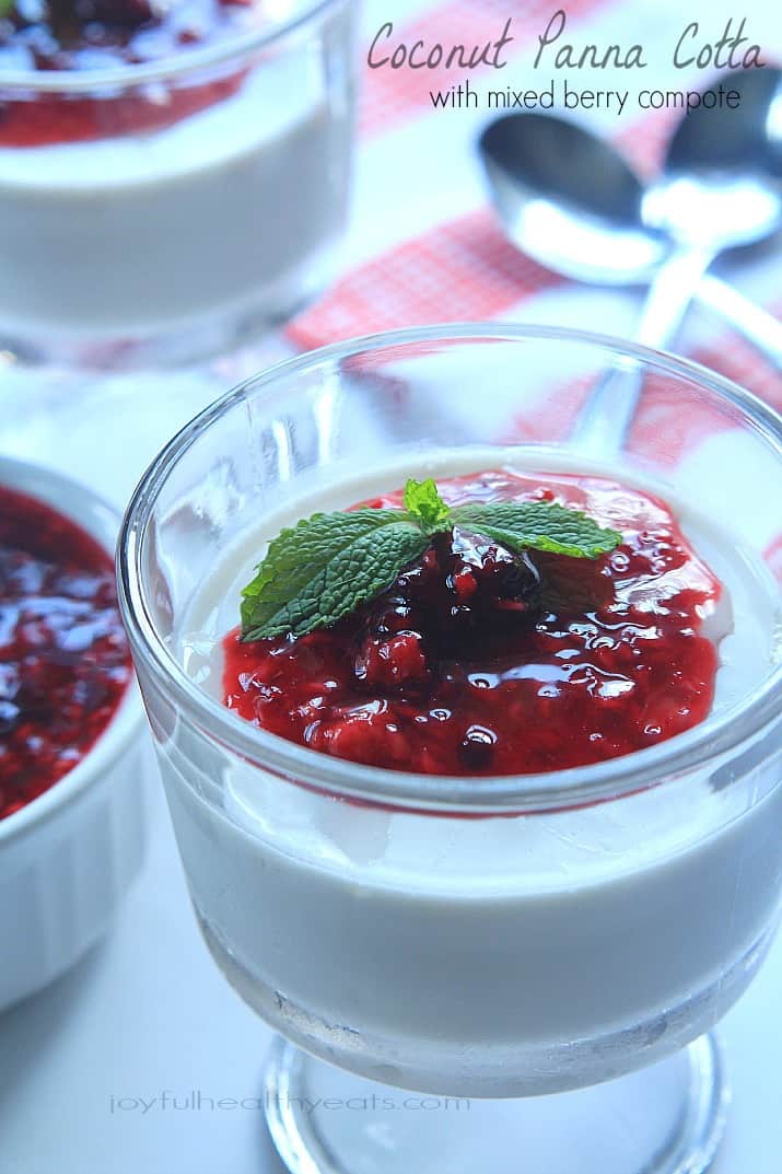 Coconut Panna Cotta topped with Raspberry Blackberry Compote in a dessert glass