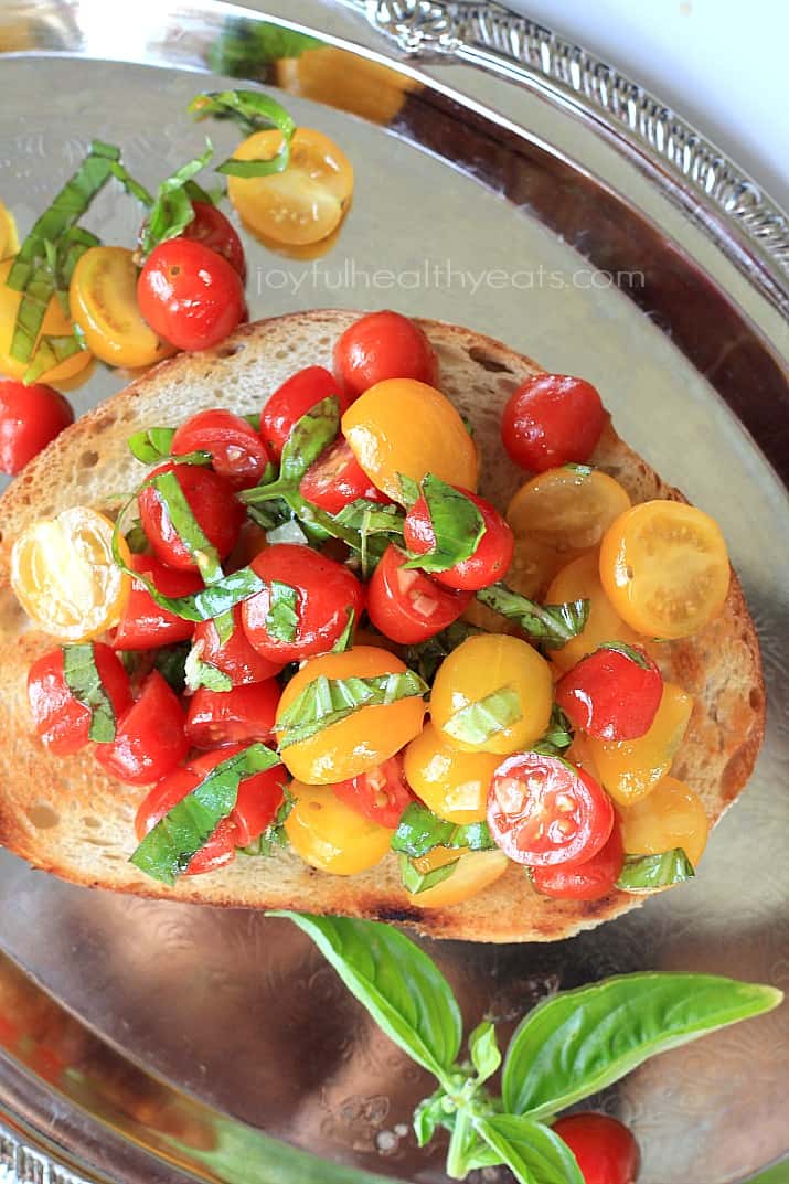 Top view of fresh Tomato Bruschetta on a slice of toasted bread