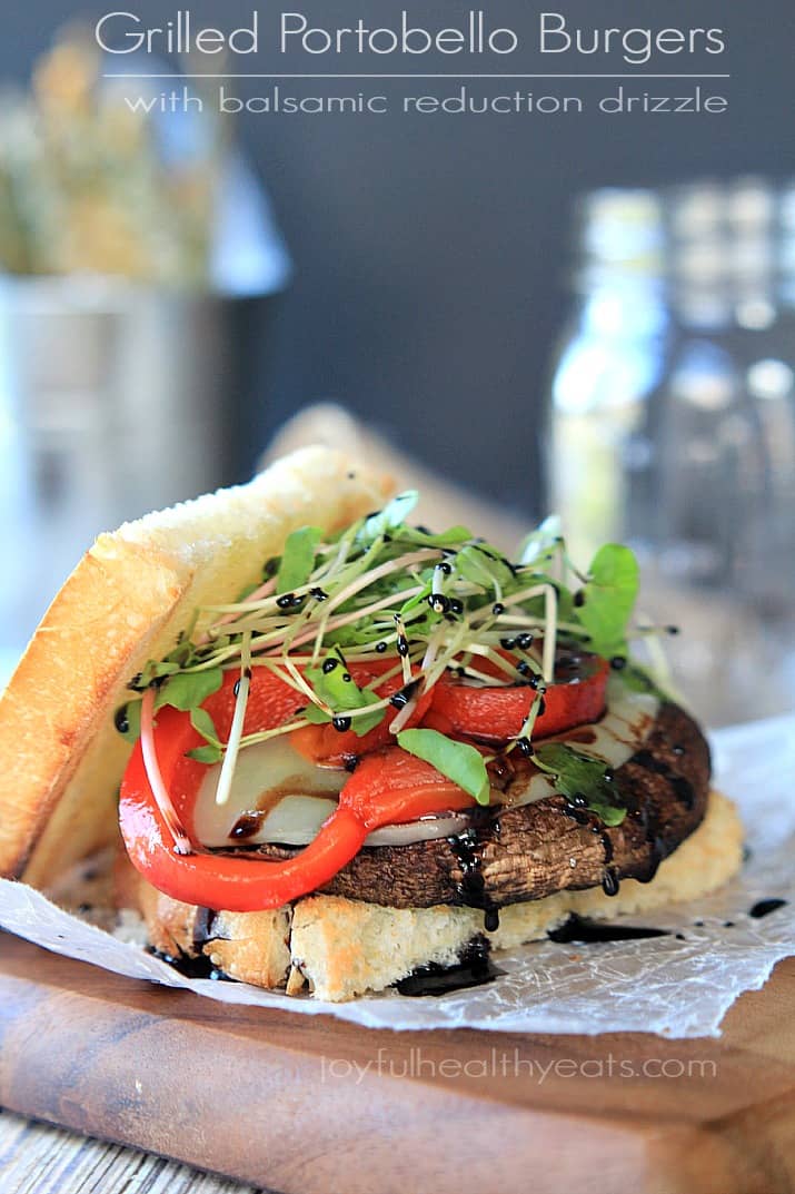 Grilled Portobello Burgers with Balsamic Reduction, red pepper, and sprouts on toasted bread