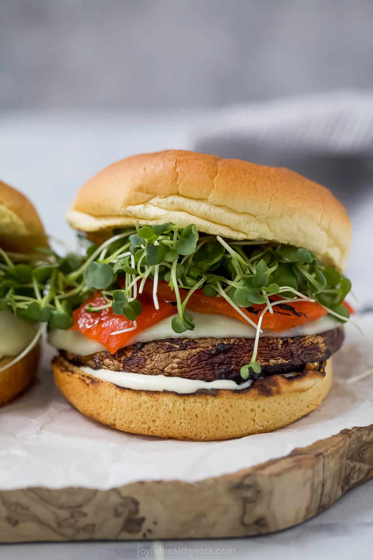 Melti provolone, roasted red pepper and creamy trafle IOli, it can only be the best portobelo mushroom sandwich! Broach Banne Grilled Portobelo Mushroom Sandwich