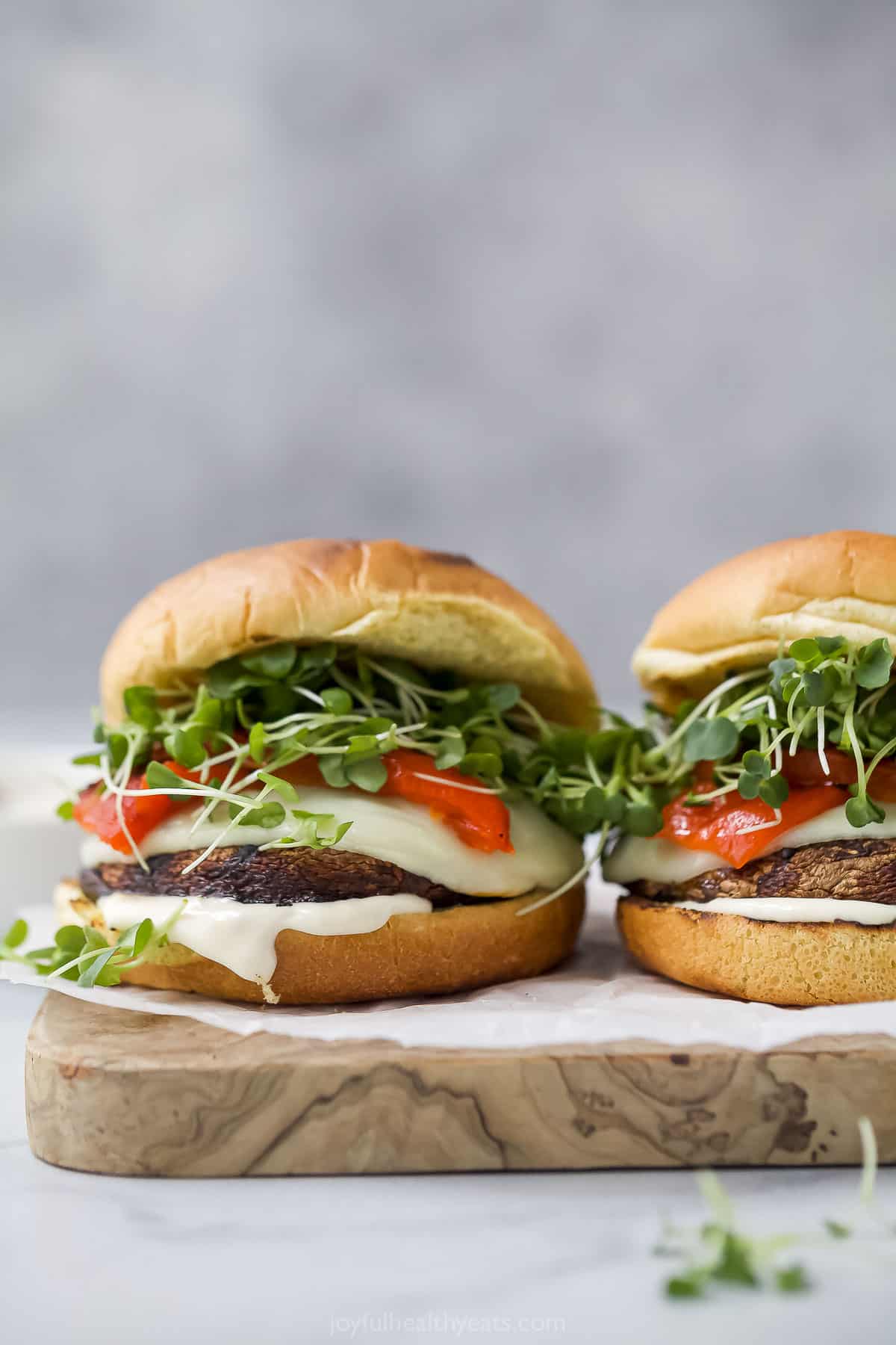 Melti provolone, roasted red pepper and creamy trafle IOli, it can only be the best portobelo mushroom sandwich! Cheese, two portobelo mushroom sandwich with cheese, fried red pepper and micrograms