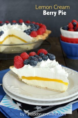 A slice of lemon cream berry pie on a plate