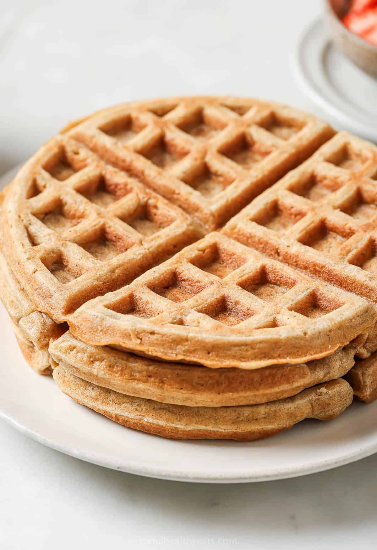 Stack of 3 oatmeal waffles on plate