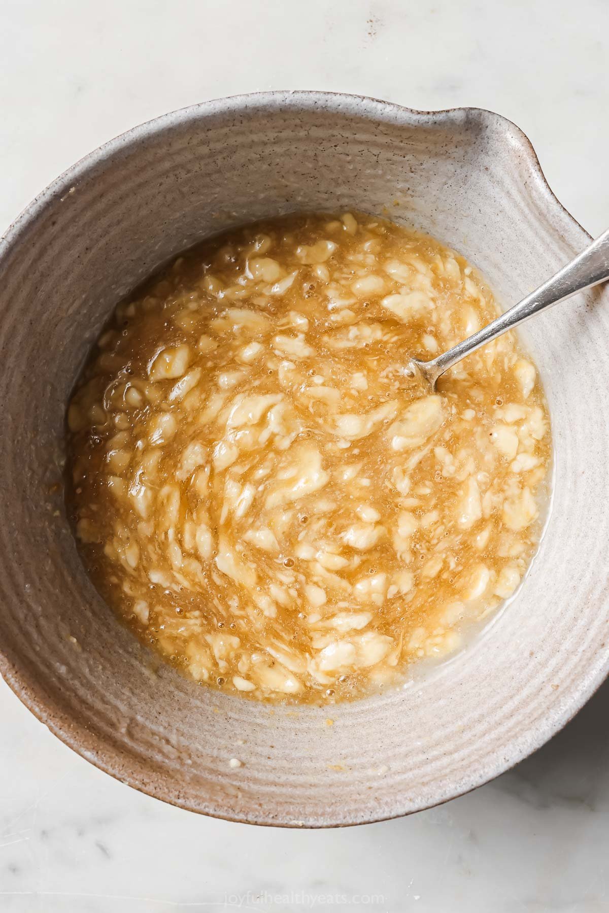 Mixing the wet ingredients in a bowl. 