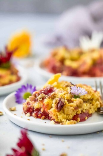 close up of plate filled with pineapple cherry dump cake