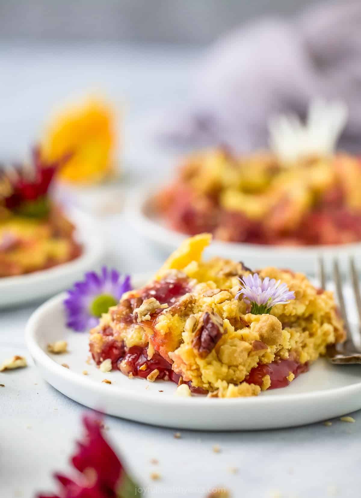 close up of plate filled with pineapple cherry dump cake