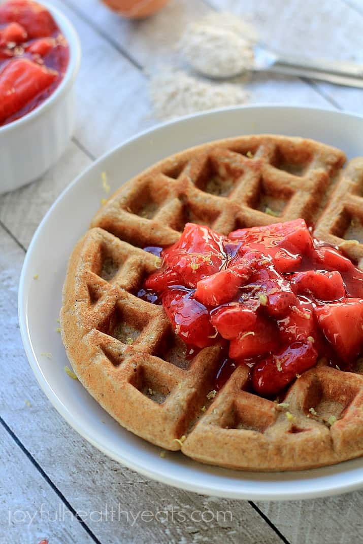 Picture of a Whole Wheat Oatmeal Waffle with Strawberry Vanilla Compote on Top