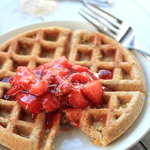 Image of a Whole Wheat Oatmeal Waffle with Strawberry Compote on a Plate