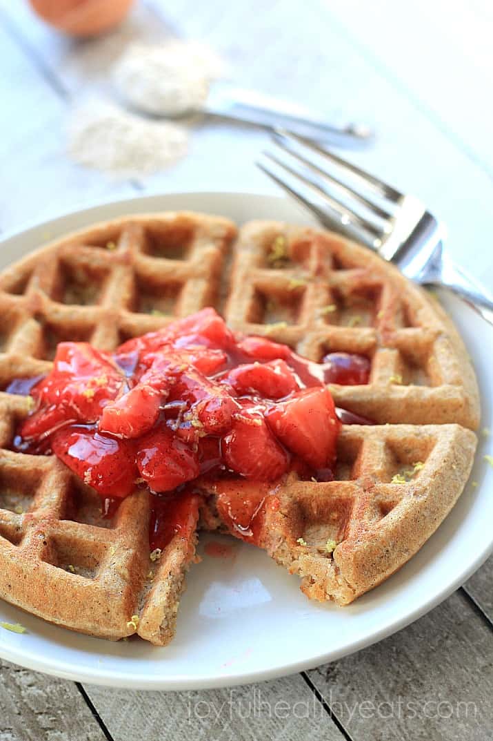 Image of a Whole Wheat Oatmeal Waffle with Strawberry Compote on a Plate