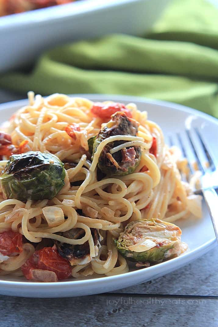 Caramelized Brussels Sprouts Pancetta Pasta with Creamy Goat Cheese Sauce on a plate