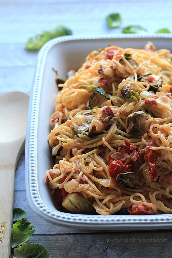 Caramelized Brussels Sprouts Pancetta Pasta with Creamy Goat Cheese Sauce in a rectangular serving dish