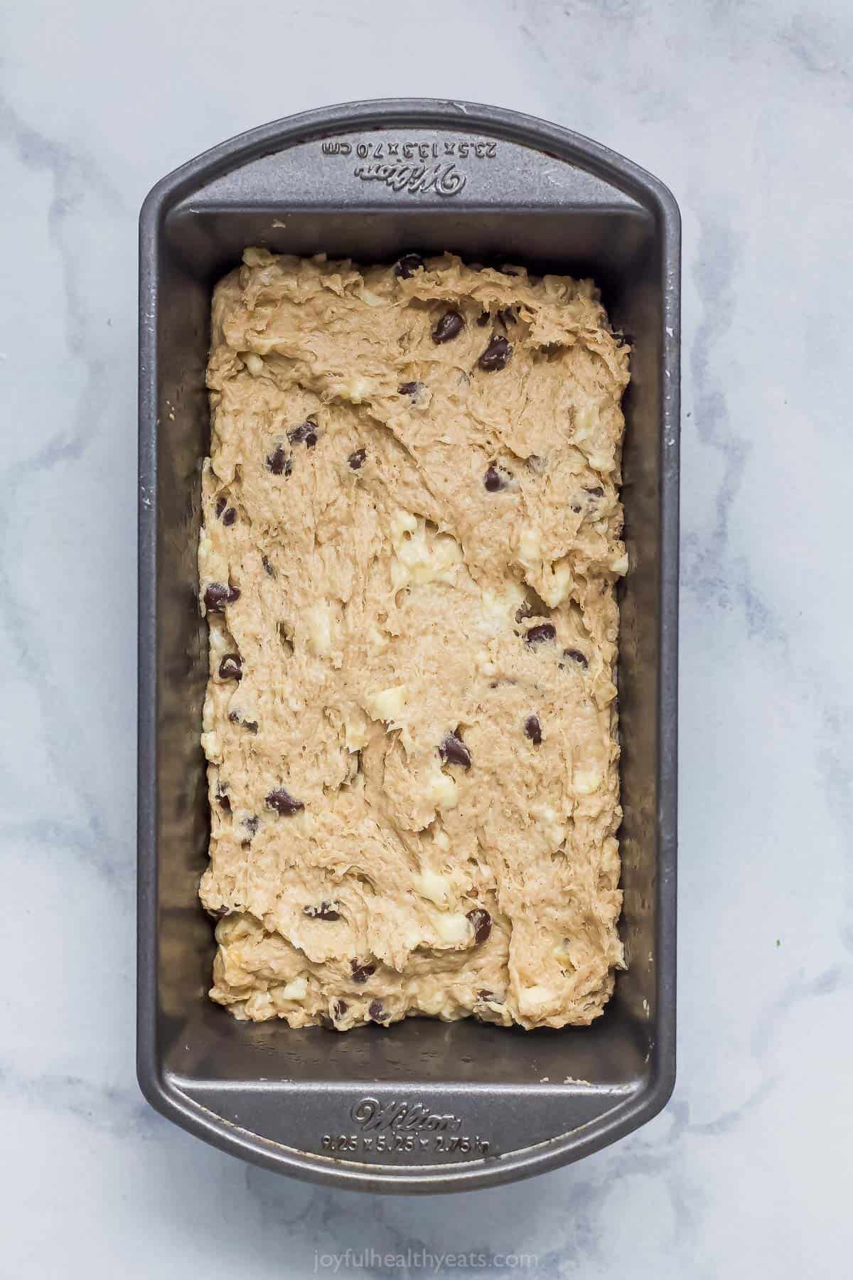 Batter in the greased loaf pan. 