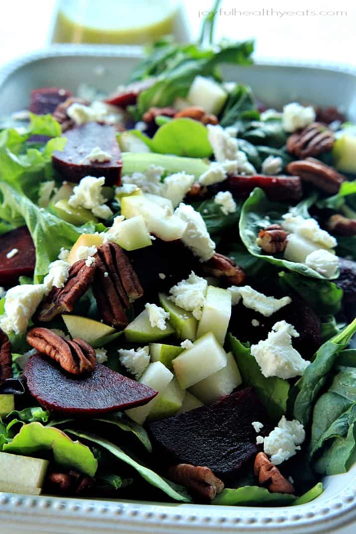 Close-up of Goat Cheese Asian Pear & Beet Salad with Honey Mustard Vinaigrette