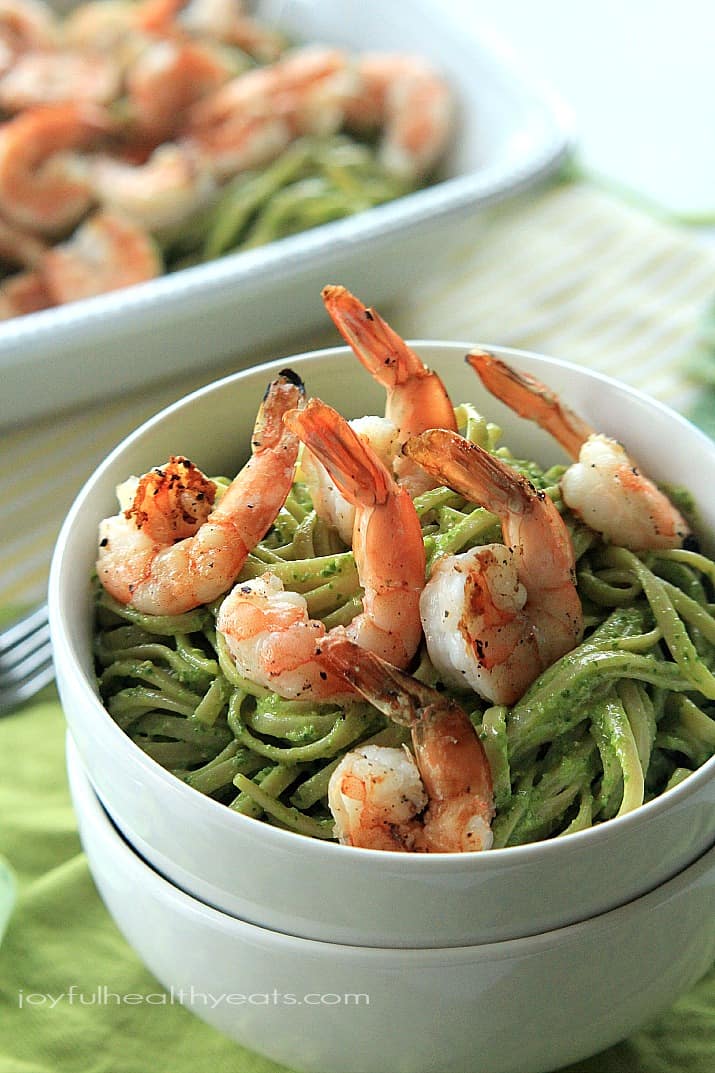 Goat Cheese Spinach Pesto Pasta with Grilled Shrimp in a bowl