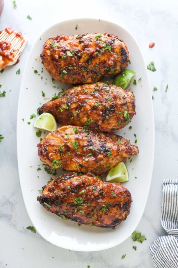 4 pieces of grilled chicken with homemade raspberry-chipotle BBQ sauce.