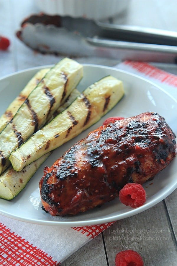 A Chipotle Chicken Breast on a Plate with Grilled Zucchini