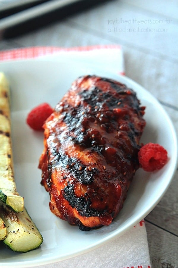 A Close-up Shot of Grilled Chicken with Raspberry BBQ Sauce