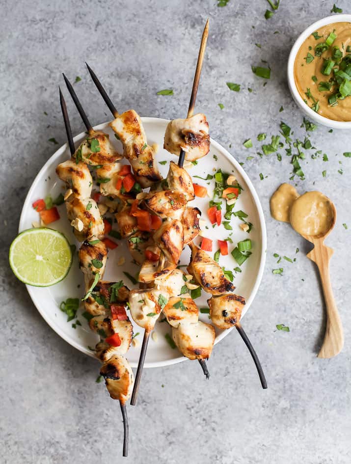 Image of Grilled Sesame Lime Chicken with Thai Peanut Sauce on a Plate