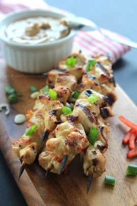 Marinated chicken skewers with peanut dipping sauce