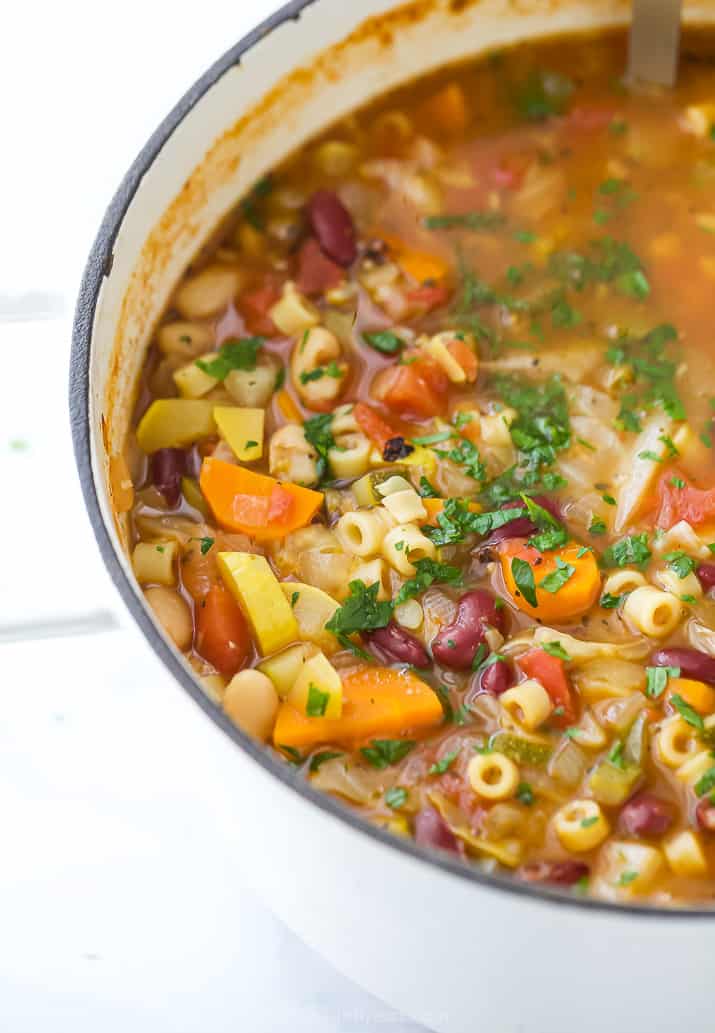 close up of easy minestrone soup in a dutch oven soup pot