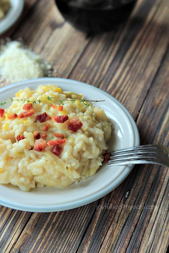 Creamy Leek Risotto with Crispy Pancetta on a plate